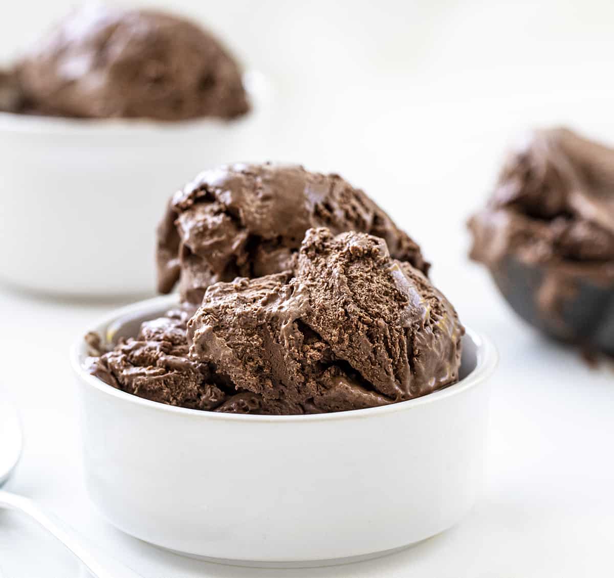 Bowls of Easy Chocolate Ice Cream on White Counter.