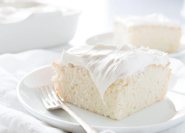 Got a sweet tooth? You are going to LOVE this easy and delicious White Snack Cake! #baking #whitecake #snackcake #buttercream #iambaker #cravingcake #cake White Cake
