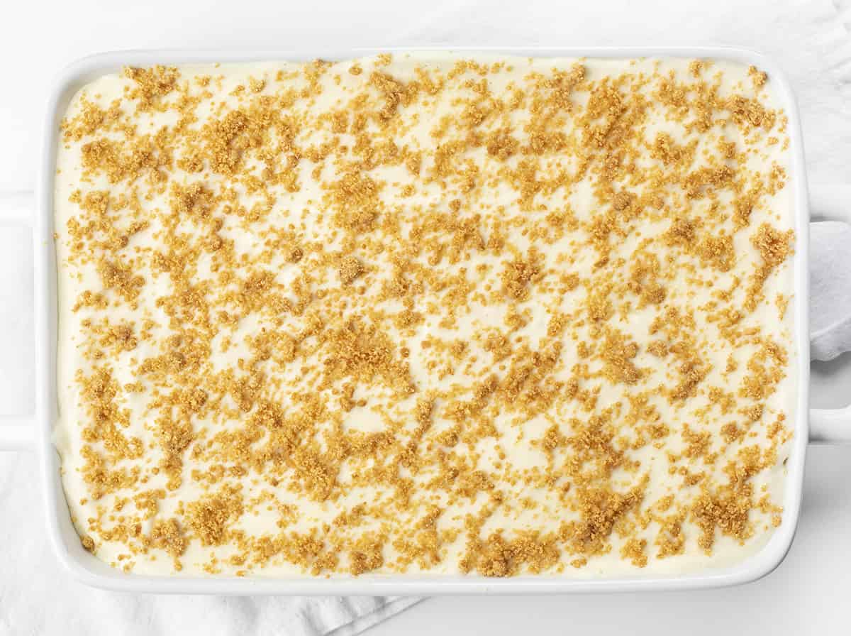 Woolworth Icebox Cheesecake Recipe is a light and fluffy, no-bake dessert with a hint of lemon flavor on top of a graham cracker crust. Woolworth Recipe, Cloud Cheesecake, Icebox Cake, BBQ, Summer Desserts, Dessert, Old Fashioned Dessert, Vintage Cake, i am baker, iambaker Woolworth Icebox Cake Recipe from Overhead